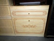 A bedside chest with a drawer & pull down drawer