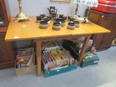 An oak folding dining table