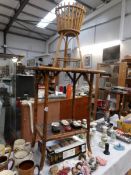 A bamboo table and plant stand