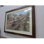 A framed and glazed railway print