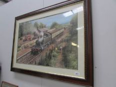 A framed and glazed railway print