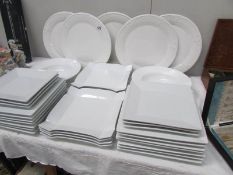 Approximately 25 pieces of white dinner ware