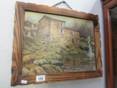 A wood framed watermill scene