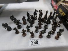 A quantity of model chess pieces