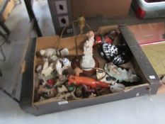 A box of assorted figures etc
