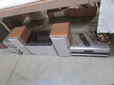A quantity of speakers, DVD player,