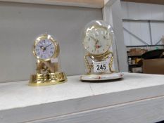 2 small anniversary clocks
