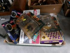 A box of games and models