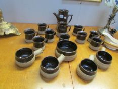 A pottery coffee and soup set