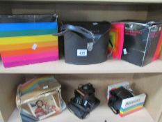 6 Polaroid cameras with 6 bags (2 shelves,