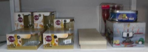 A mixed lot of boxed glass ware