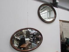 2 oval mirrors