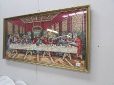 A hand made framed and glazed rug depicting the last supper