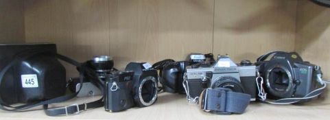 A quantity of SLR cameras and others