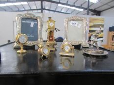 A mixed lot of miniature clocks,