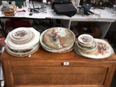 A large quantity of hunting scene plates