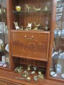 A large quantity of brass items including figures,