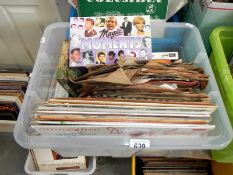 A box of 45 rpm & LP records including Buddy Holly etc.