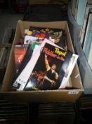 A box of show programmes