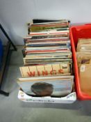 A box of LP's including Wings & Jean Michel Jarre