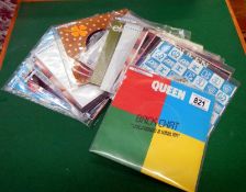 A quantity of Queen import singles from Spain, Germany & Japan etc.