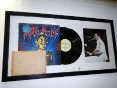 A framed & glazed Queen collagefeaturing a signed copy of Metropolis by Freddie Mercury picture