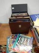 2 cases of LP's including Queen, T. Rex & Slade etc.