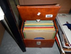 A box of 45rpm records including Elvis, Cliff Richards,