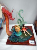 A dragon figure with mythical creature