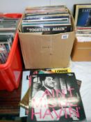 A box of LP records including The Clash, Elvis Costello, Blondie & The Banshees etc.