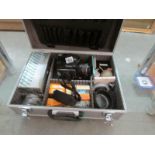 A cased Mamiya M645 film camera and accessories