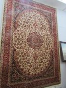 A beige ground Keshan rug, 2.3 x 1.