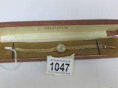 A ladies Audax gold wrist watch