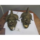 2 brass wall masks