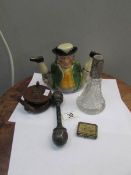 A Wood's teapot, a silver rimmed perfume bottle missing stopper,