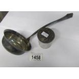 A continental (800) silver ladle and a silver topped jar