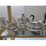 A three piece silver plated tea set