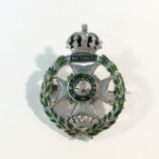 A 9ct white gold rifle brigade badge