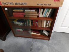 A large quantity of books in bookcase