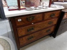 A 2 over 2 chest of drawers with marble top