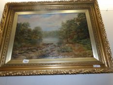 A 19th century oil on canvas 'Landscape and River' signed J Herrin