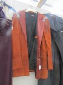 A leather western style jacket with fringes