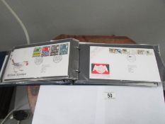 An album of 55 UK first day covers,