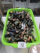 A quantity of toy soldiers