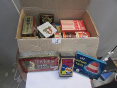 A mixed lot of old tins and boxes