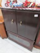 A mahogany TV cabinet