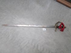 A sword with brass hilt,