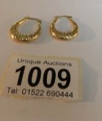 A pair of 9ct gold hoop earrings