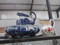 A blue and white jug and basin set together with a 19th century Staffordshire jug