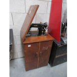 A Singer 201K EJ901826 electric conversion sewing machine via treadle including instructions,